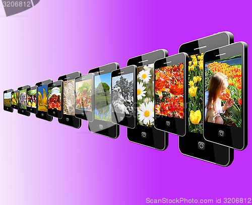 Image of Modern mobile phones with different images