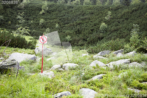 Image of No pedestrians sign in nature park