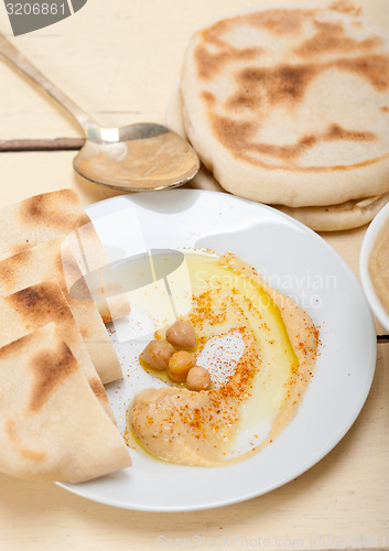 Image of Hummus with pita bread 