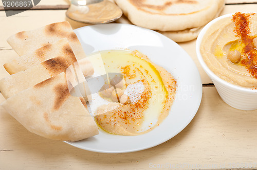 Image of Hummus with pita bread 