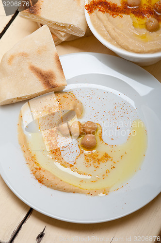 Image of Hummus with pita bread 