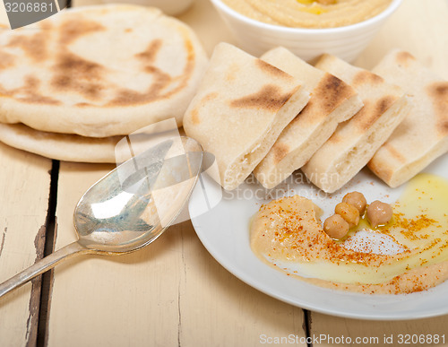 Image of Hummus with pita bread 