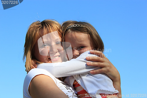 Image of mother and daughter embrace