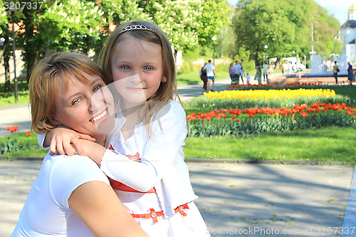 Image of mother and daughter are embracing