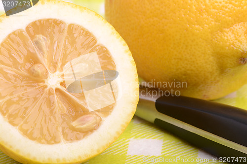 Image of juicy ripe lemons close up