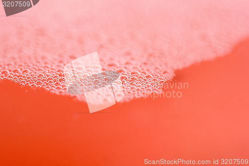 Image of red water drops close up