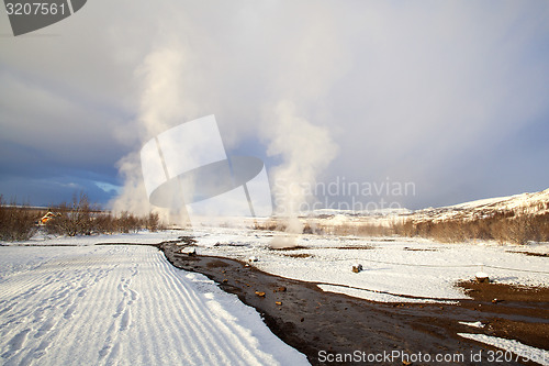 Image of Several Geysers in a winter landscape in Iceland