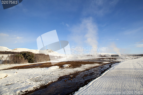 Image of Several Geysers in a winter landscape in Iceland