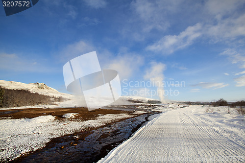 Image of Several Geysers in a winter landscape in Iceland