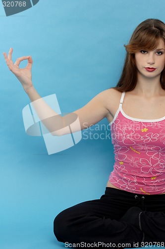 Image of Woman doing yoga