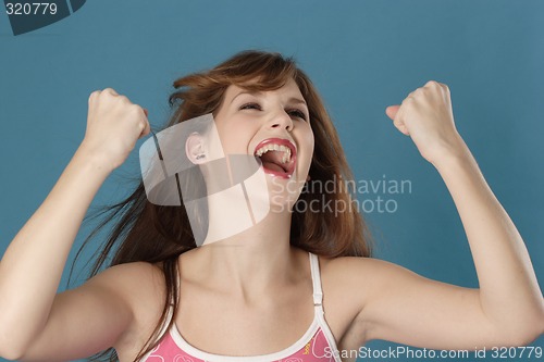 Image of Woman looking jubilant