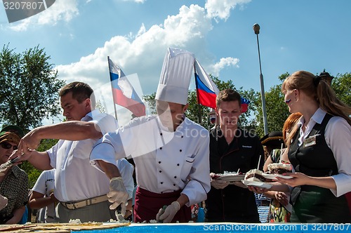 Image of A cake in the shape of the flag of Russia