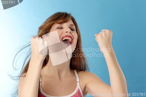 Image of Woman looking jubilant