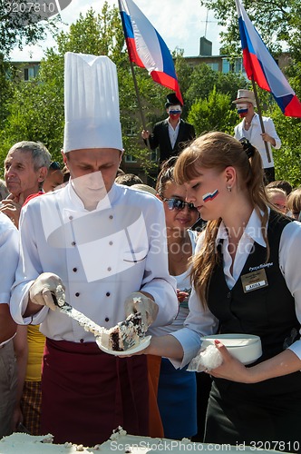 Image of A cake in the shape of the flag of Russia