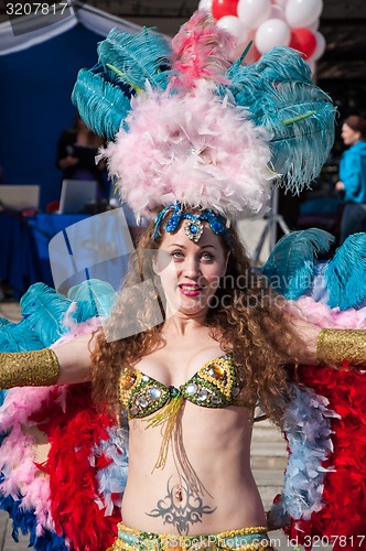 Image of Girl dancing on the street of the city