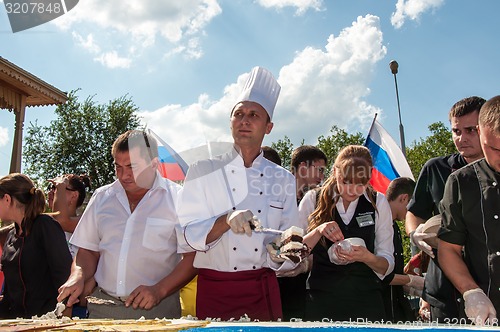 Image of A cake in the shape of the flag of Russia