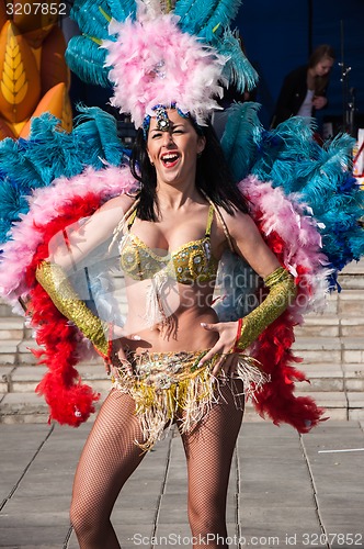 Image of Girl dancing on the street of the city