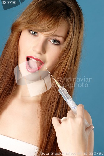 Image of Woman with syringe