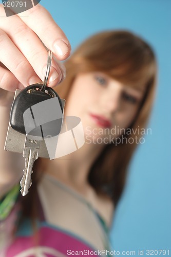 Image of Woman with car key