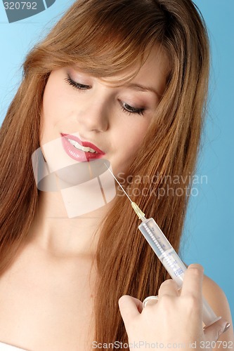 Image of Woman with syringe