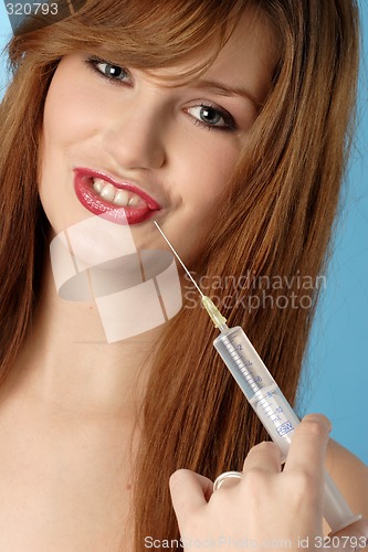 Image of Woman with syringe