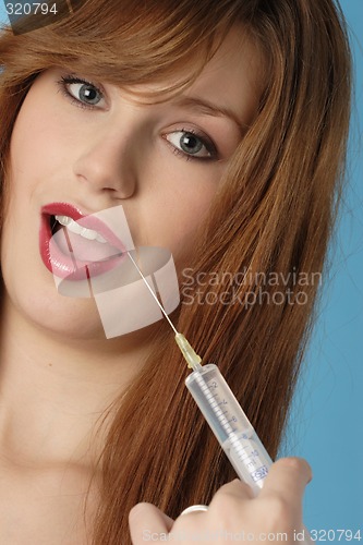 Image of Woman with syringe