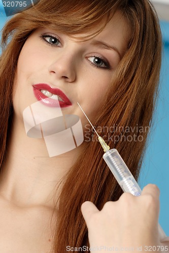 Image of Woman with syringe