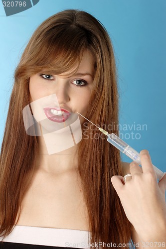 Image of Woman with syringe