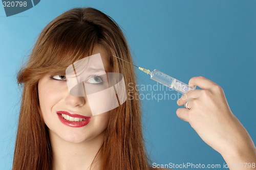 Image of Woman with syringe