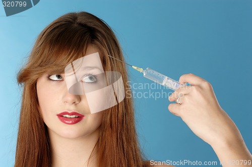 Image of Woman with syringe