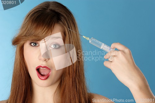 Image of Woman with syringe