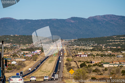 Image of long highway stretch in the new mexico mountains