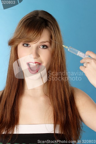 Image of Woman with syringe