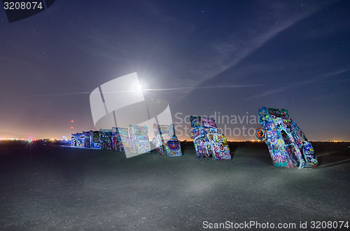 Image of AMARILLO, TEXAS - April 2015: Famous art installation Cadillac R