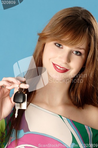 Image of Woman with car key