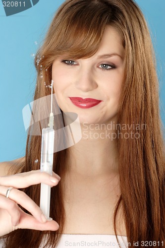 Image of Woman with syringe