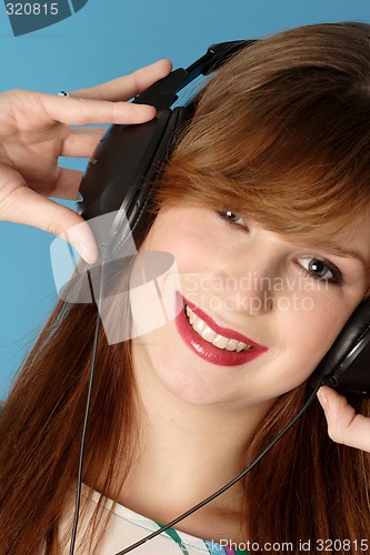 Image of Woman listening music