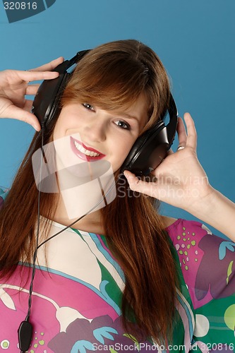 Image of Woman listening music