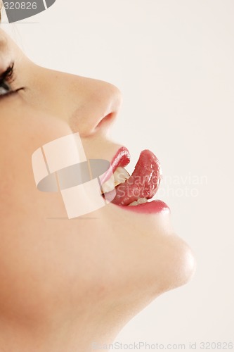 Image of Woman sticking out tongue