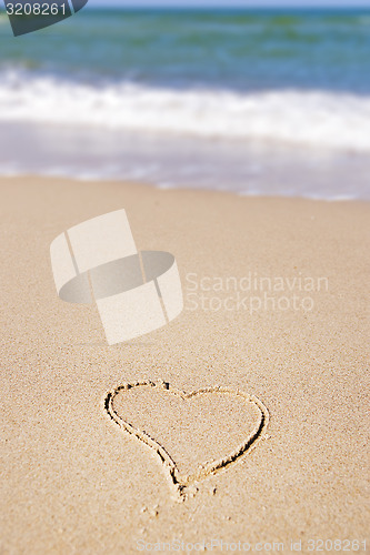 Image of Heart in sand on the beach