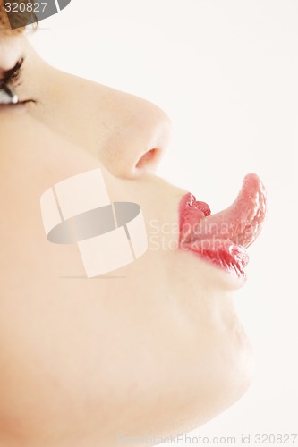 Image of Woman sticking out tongue