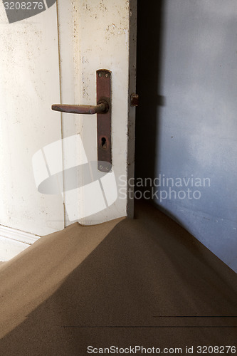 Image of Door and sand