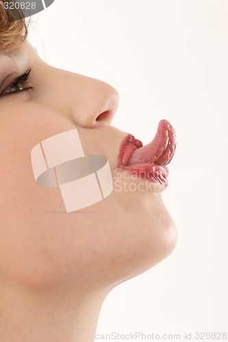Image of Woman sticking out tongue