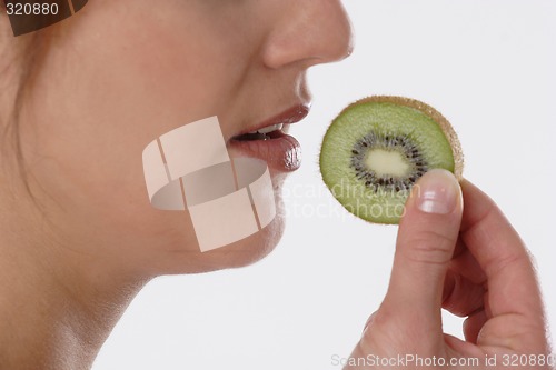 Image of Woman with kiwi