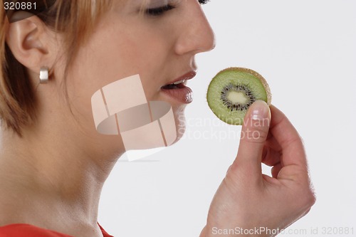 Image of Woman with kiwi