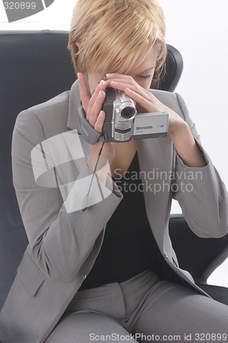 Image of Businesswoman with video camera