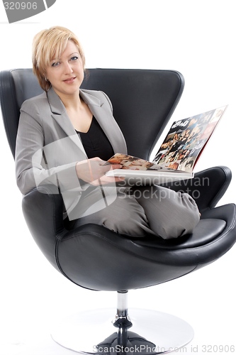 Image of Businesswoman reading book