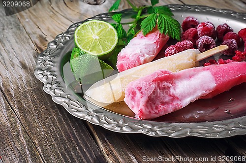 Image of raspberry ice cream with old tray