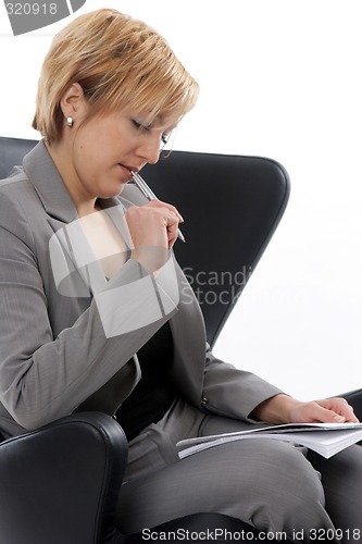 Image of Businesswoman thinking on chair