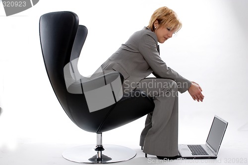 Image of Businesswoman with laptop